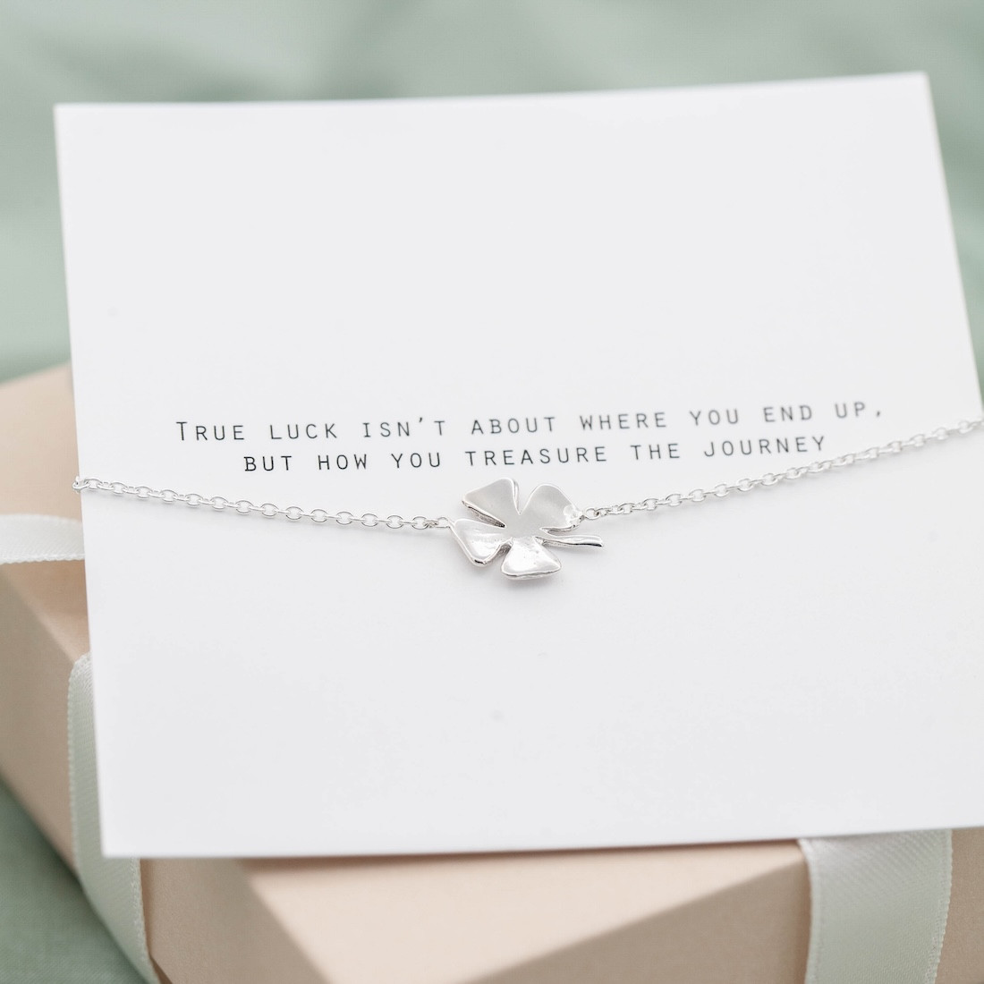 Silver bracelet four leaf clover