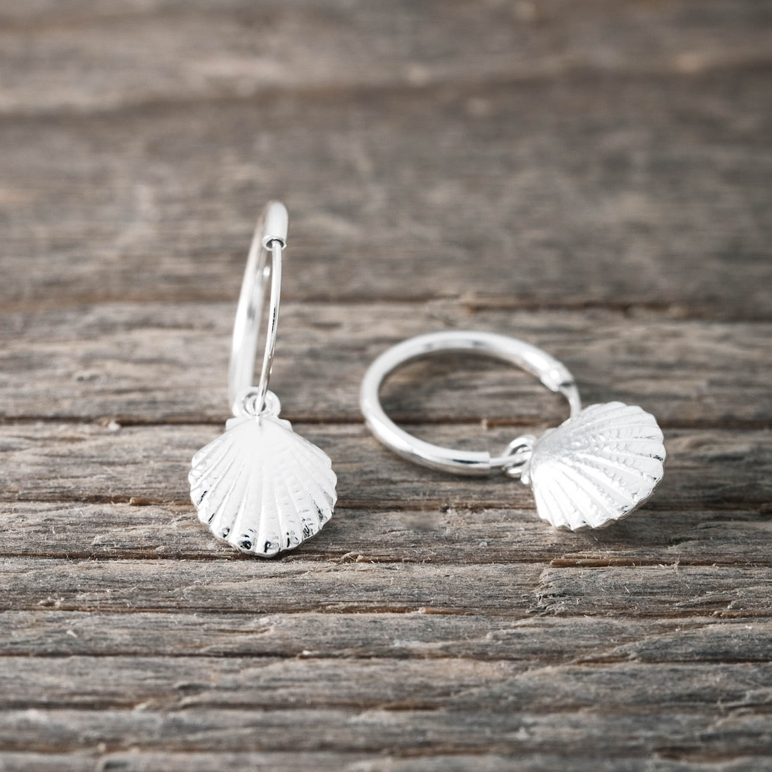 Silver hoop with small seashell
