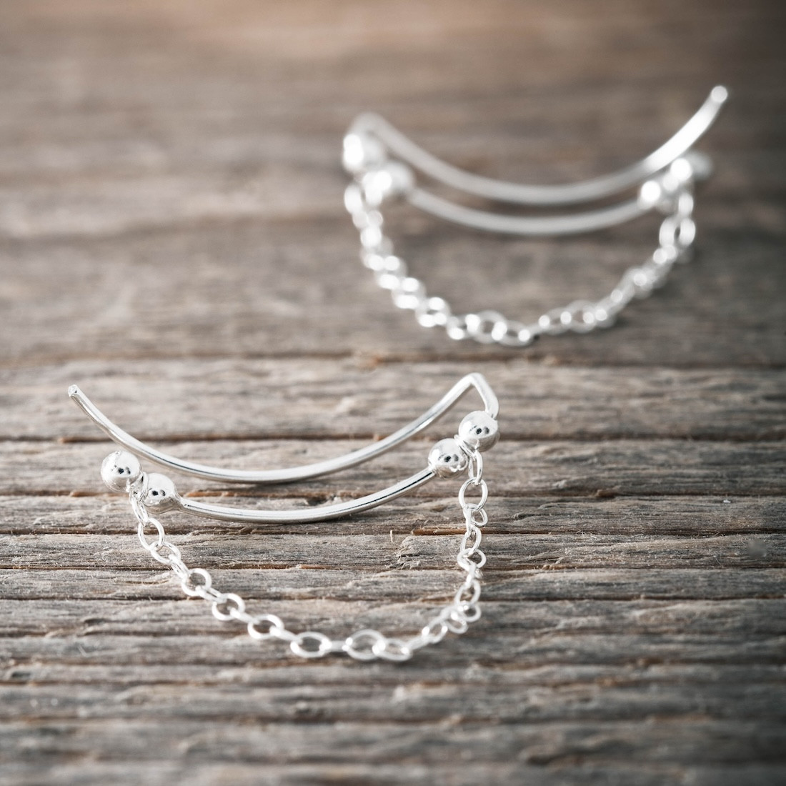 Ear climber with chain