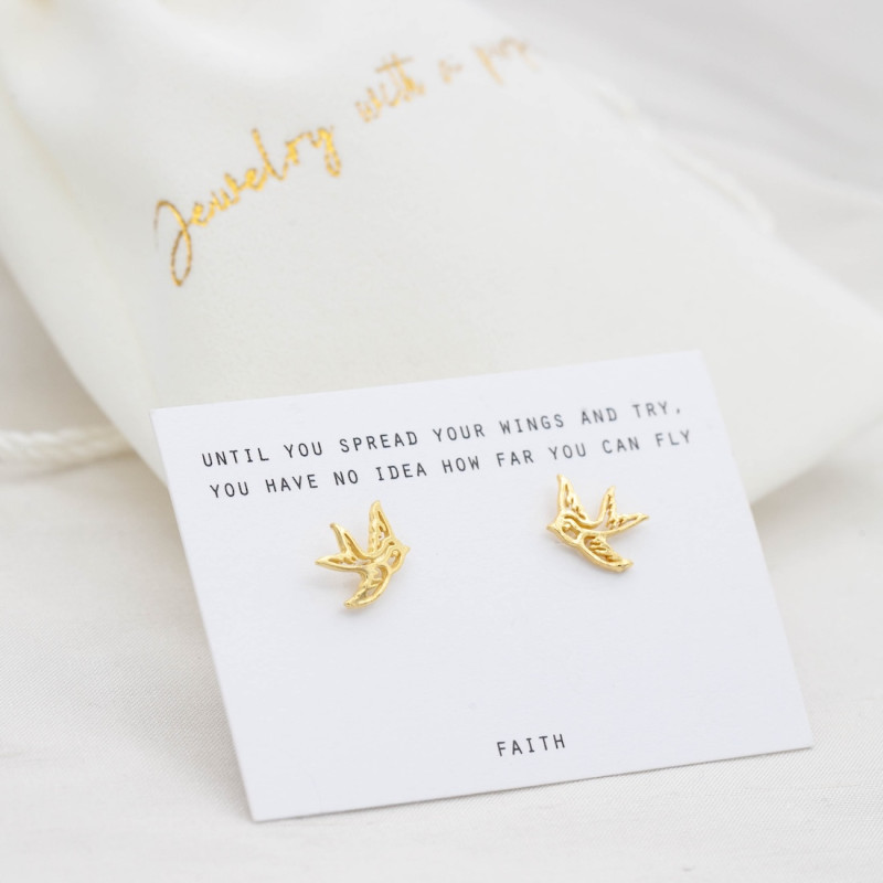 Gold earrings contour swallow