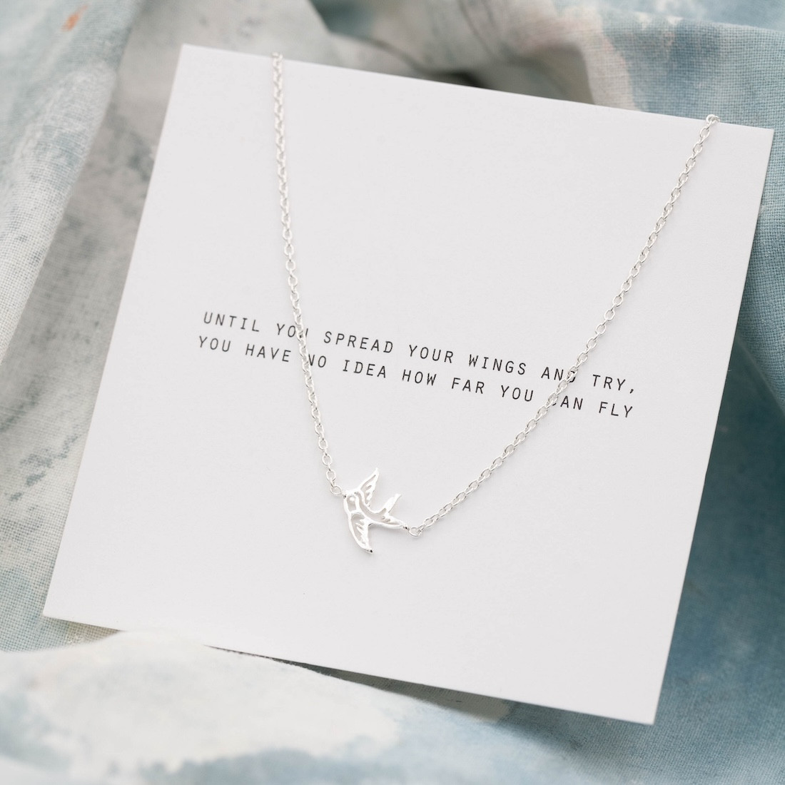 Silver necklace swallow