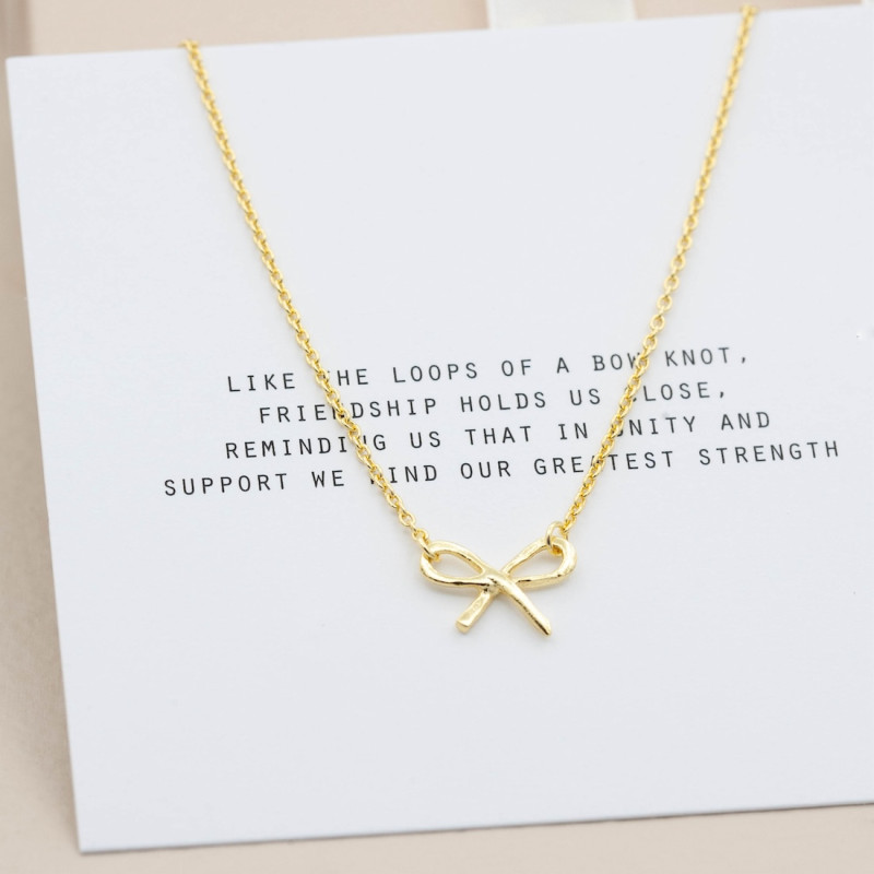 Gold necklace small bow