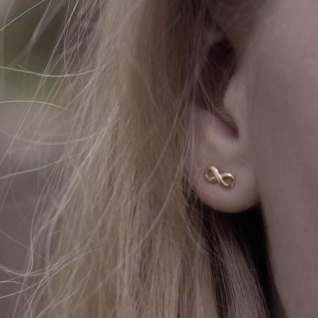 Gold earrings small infinity