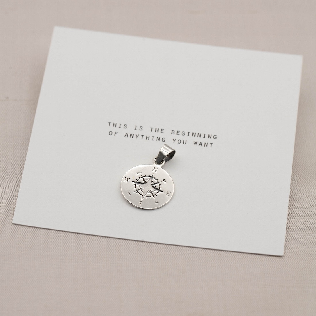 silver pendant big compass