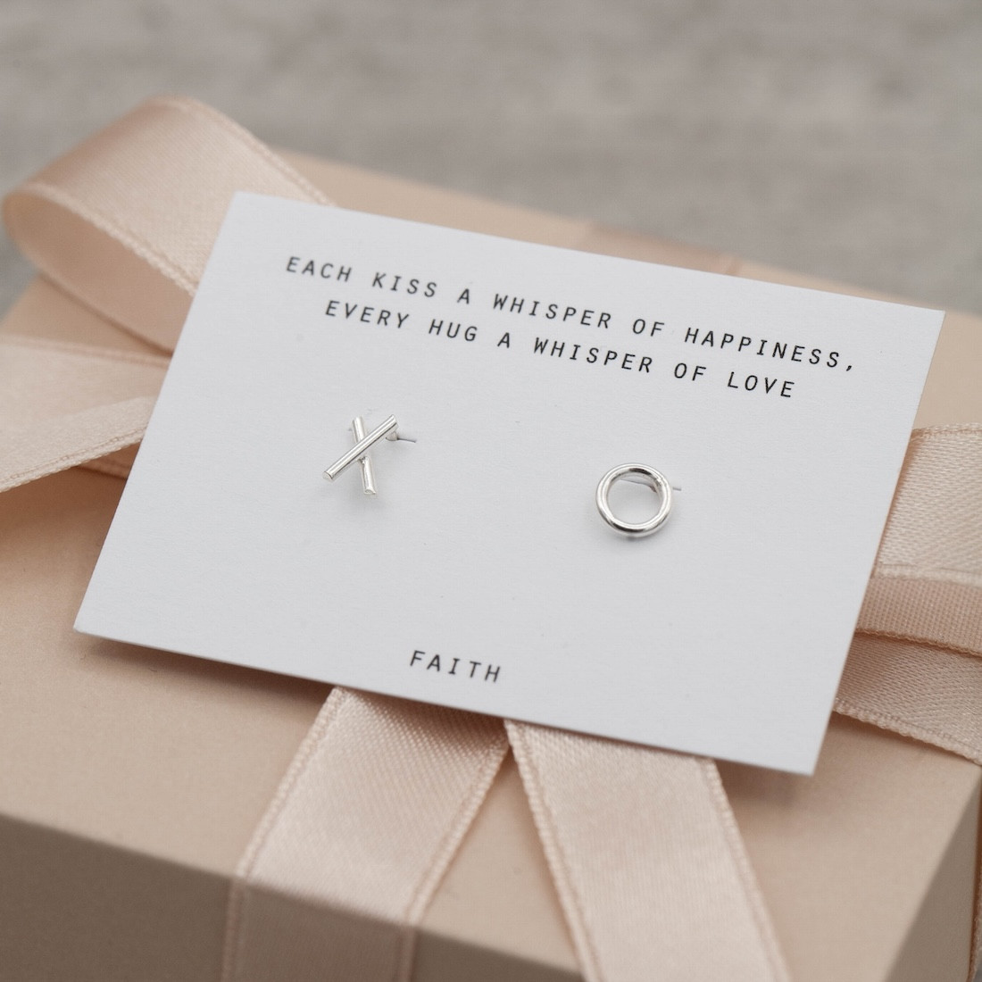 Silver ear studs X O
