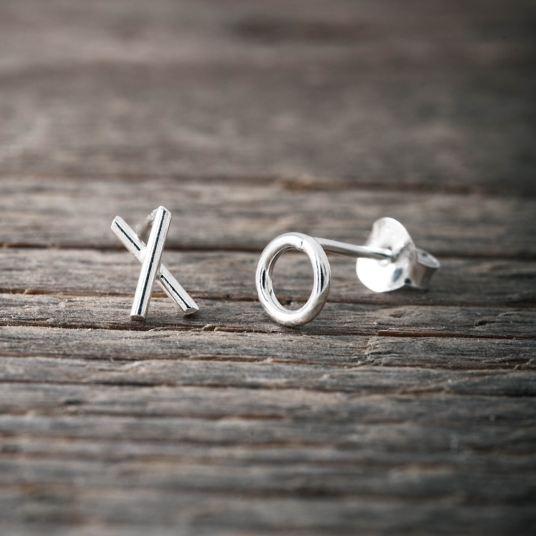 Silver ear studs X O