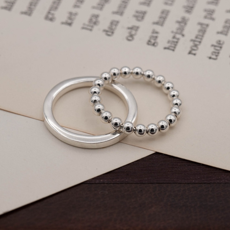 Silverring 3mm rörliga kulor runt om