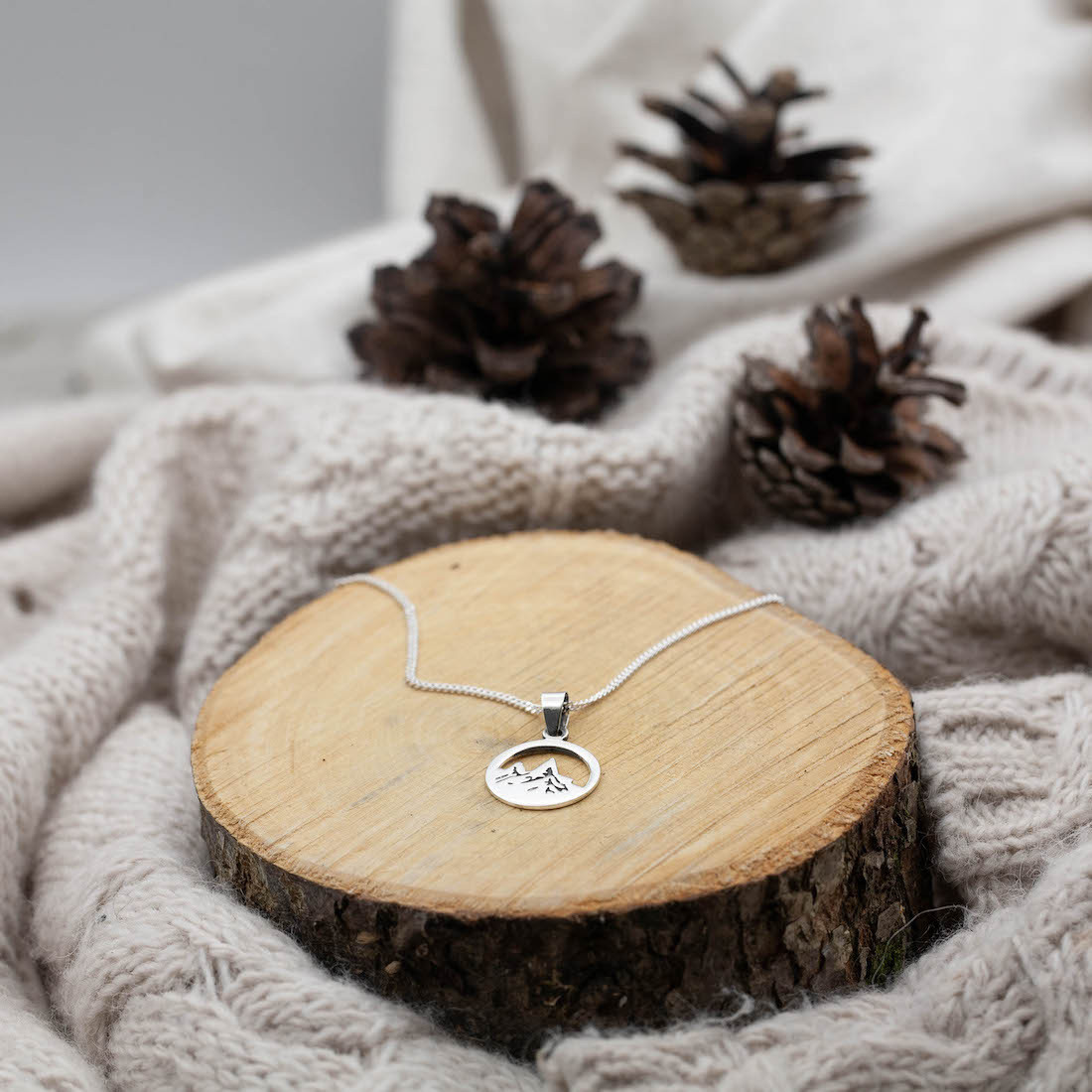 Silver pendant mountain top