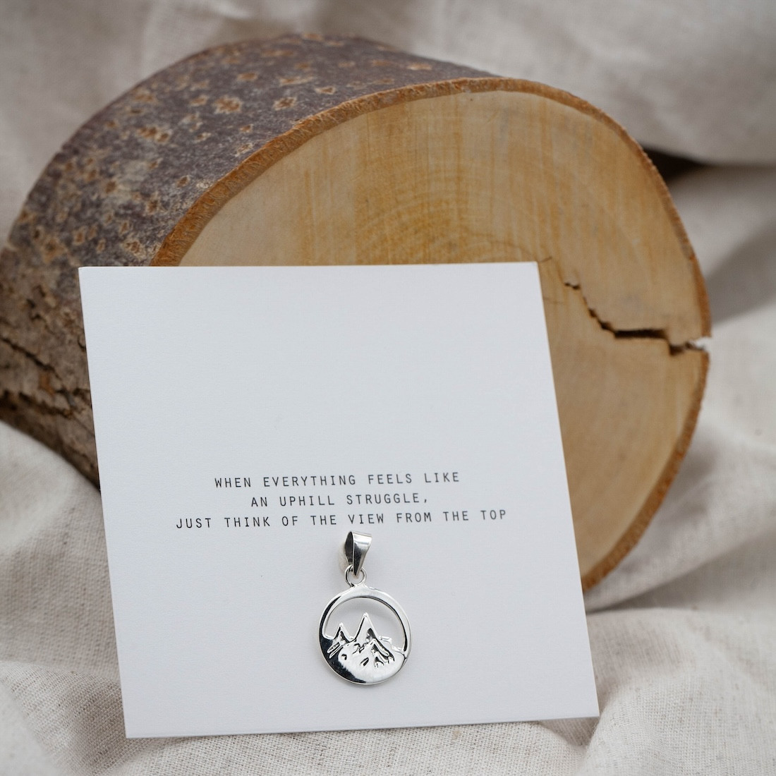 Silver pendant mountain top