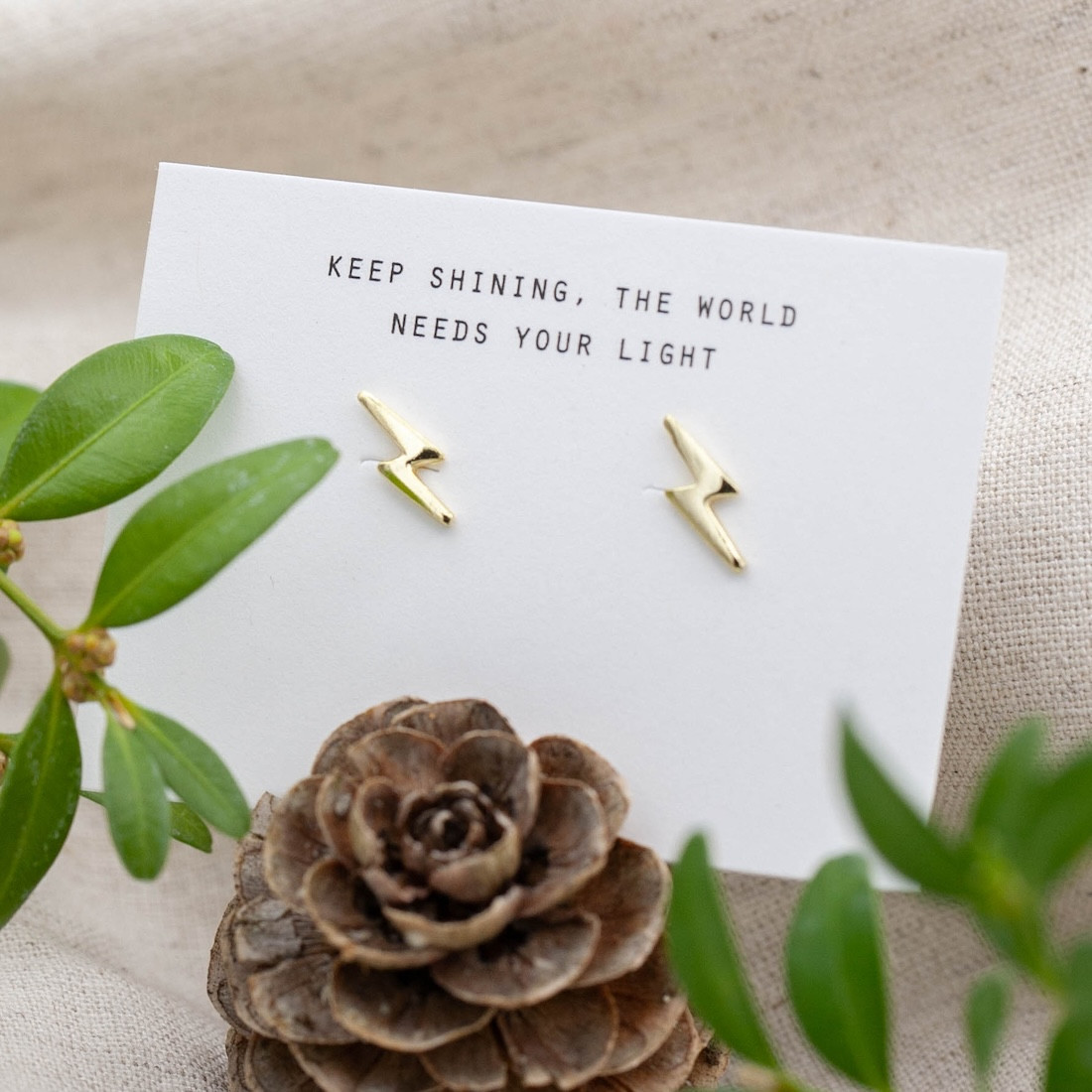 Gold earrings lightning bolt