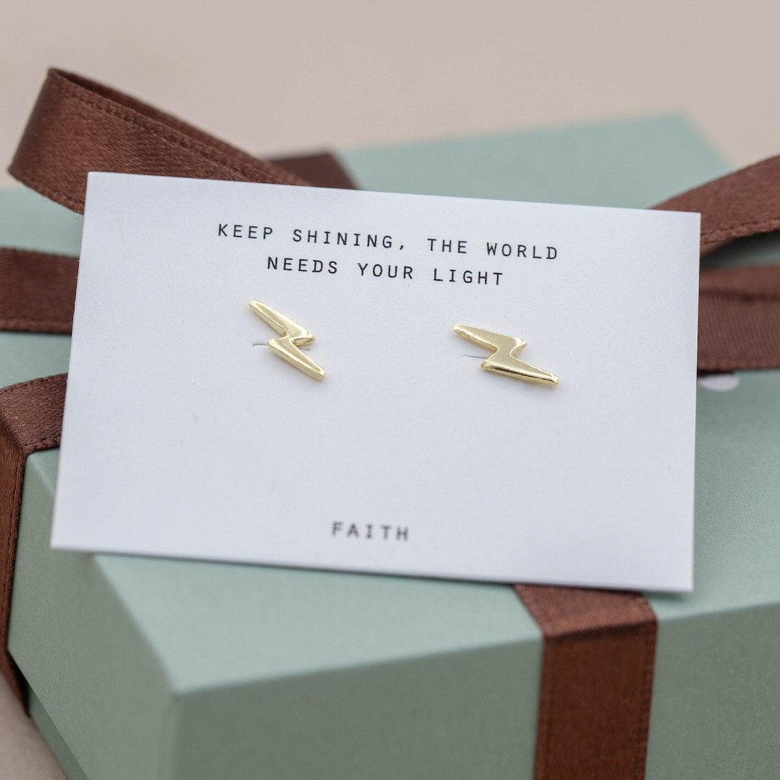 Gold earrings lightning bolt